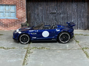 Hot Wheels '15 Jaguar F-Type Project 7 dark blue loose roadster, left-side view