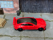 Hot Wheels Jaguar XE SV Project 8 red — top view