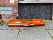 Hot Wheels Lakester orange variation-pending loose car, left-side view