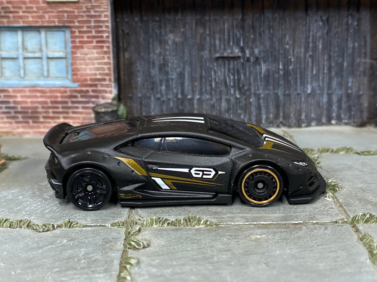 Hot Wheels LB-WORKS Lamborghini Huracan Coupe black number 63, right side view