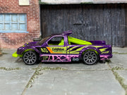 Hot Wheels Limited Grip purple Leighton Racing number 40 loose truck, left side view