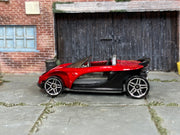 Hot Wheels Lotus Elise 340R red and black loose car, left side view