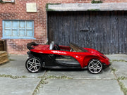 Hot Wheels Lotus Elise 340R red and black loose car, right side view