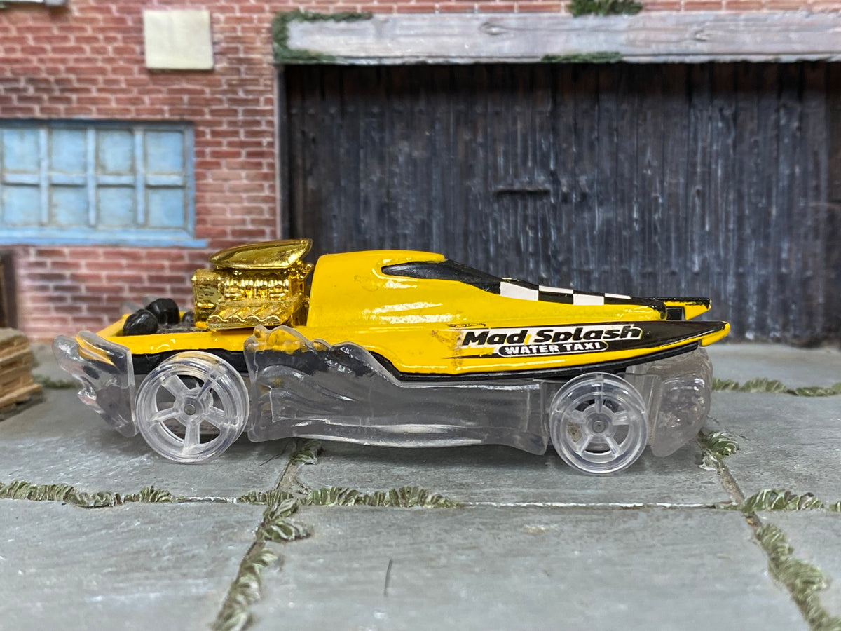 Hot Wheels Mad Splash yellow Water Taxi, right side view