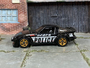 Hot Wheels Mazda RX-7 black Police loose car, left side view
