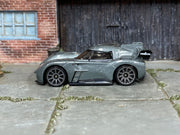 Hot Wheels McMurtry Spéirling slate gray loose car, left-side view