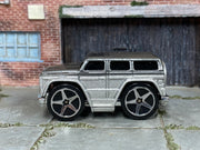 Hot Wheels Mercedes-Benz G500 Blings silver and gray loose car, left side view