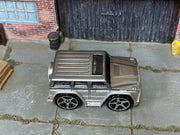 Hot Wheels Mercedes-Benz G500 Blings silver and gray loose car, top view