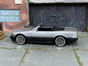 Hot Wheels Mercedes-Benz SL 500SL silver and black loose convertible, left side view