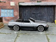 Hot Wheels Mercedes-Benz SL 500SL silver and black loose convertible, right side view