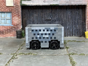 Gray Hot Wheels Minecraft Minecart with pixel blocks, opposite-side view