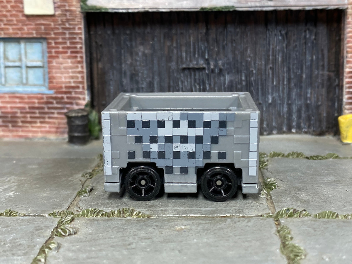 Gray Hot Wheels Minecraft Minecart with pixel blocks, side view