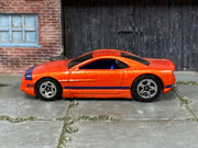 Hot Wheels Muscle Tone orange with purple stripes, left side view