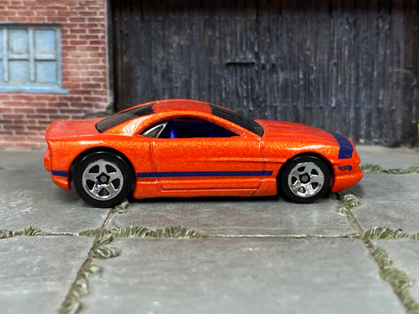 Hot Wheels Muscle Tone orange with purple stripes, right side view
