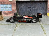Hot Wheels No Fear Race Car in black with number 1, left side view