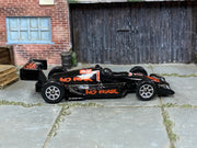 Hot Wheels No Fear Race Car in black with number 1, right side view