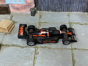 Hot Wheels No Fear Race Car in black with number 1, top view