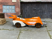 Hot Wheels Ollie Rocket orange 2026 X6999 loose vehicle, side view