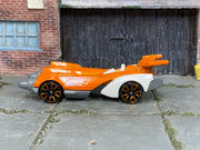 Hot Wheels Ollie Rocket orange 2026 X6999 loose vehicle, opposite side view