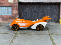 Hot Wheels Ollie Rocket orange 2026 X6999 loose vehicle, opposite side view