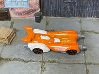 Hot Wheels Ollie Rocket orange 2026 X6999 loose vehicle, top view