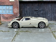 Hot Wheels Pagani Utopia in pearl light gray, left-side view of loose car