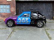 Hot Wheels Peugeot 205 Rallye purple blue and black loose car, left side view