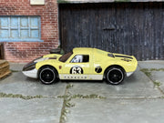 Hot Wheels Porsche 904 Carrera GTS pale yellow number 63 loose car, left-side view
