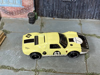 Hot Wheels Porsche 904 Carrera GTS pale yellow number 63 loose car, top view