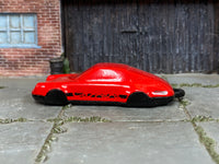 Hot Wheels Porsche 911 Carrera Clip red and black loose model, left-side view