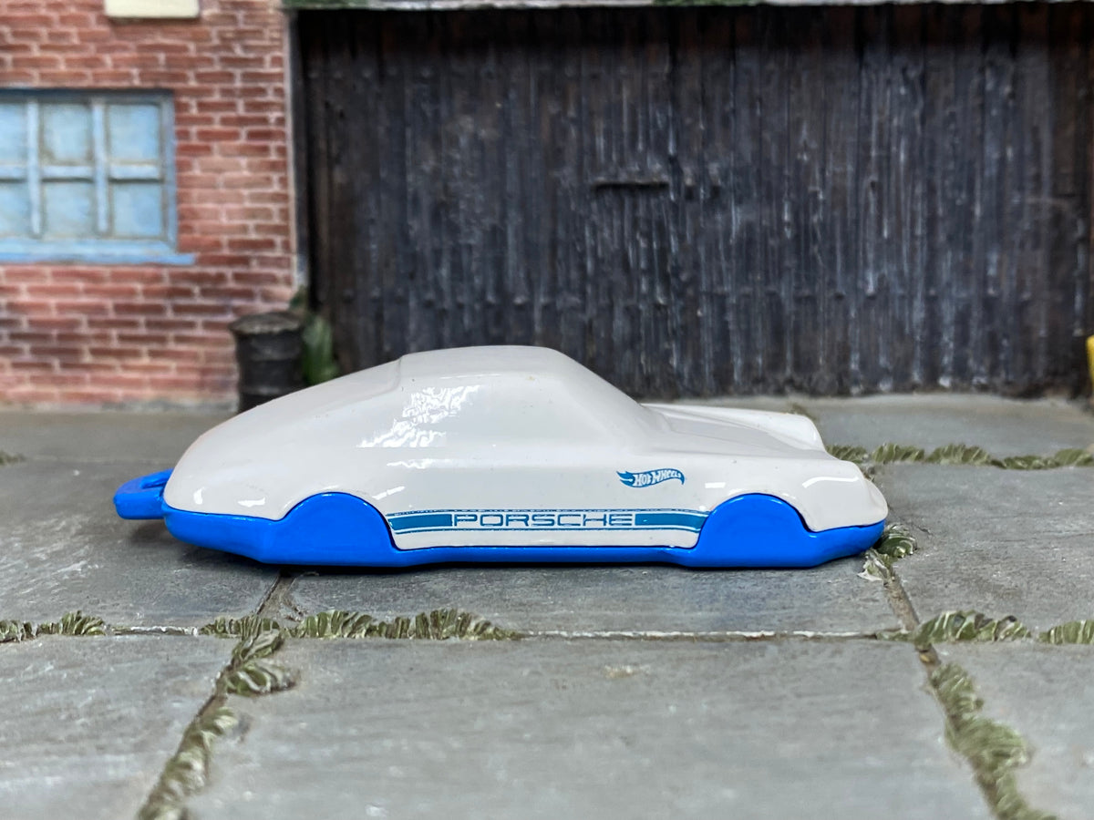 White and blue Hot Wheels Porsche 911 Carrera Clip — right side view