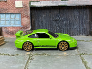 Hot Wheels Porsche 911 GT3 RS lime green with bronze wheels, right side view