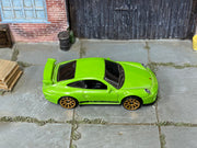 Hot Wheels Porsche 911 GT3 RS lime green with bronze wheels, top view
