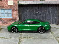 Hot Wheels Porsche Taycan Turbo S metallic green, left side view