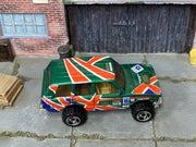 Hot Wheels Range Rover metallic green with Union Jack graphics, top view