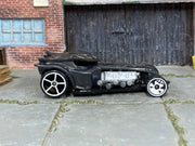 Hot Wheels Ratical Racer dark gray with silver flames, right-side view