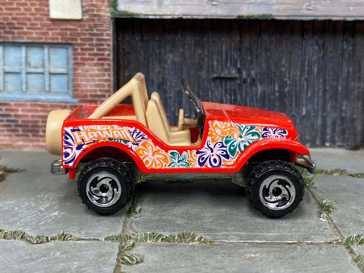 Hot Wheels Roll Patrol red Hawaii floral graphics, right side view