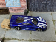 Hot Wheels Saleen S7 metallic blue and white, top view with visible loose-car wear