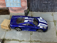 Hot Wheels Saleen S7 metallic blue and white, top view with visible loose-car wear