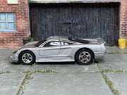 Hot Wheels Saleen S7 silver loose car, left side view