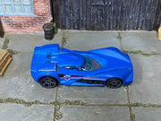 Hot Wheels Scoopa Di Fuego in blue police graphics, top view