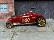 Hot Wheels Sooo Fast oxblood number 500 with weathered graphics, left side view