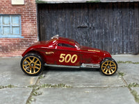 Hot Wheels Sooo Fast oxblood number 500 with weathered graphics, right side view