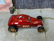 Hot Wheels Sooo Fast oxblood number 500 with weathered graphics, top view
