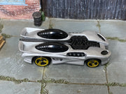 Silver Hot Wheels Splittin’ Image II with gold-colored wheels — top view