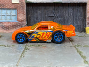Hot Wheels Stockar transparent orange number 18 loose car, left-side view