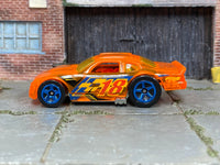 Hot Wheels Stockar transparent orange number 18 loose car, left-side view