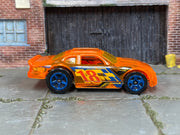 Hot Wheels Stockar transparent orange number 18 loose car, right-side view