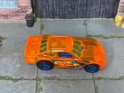 Hot Wheels Stockar transparent orange number 18 loose car, top view