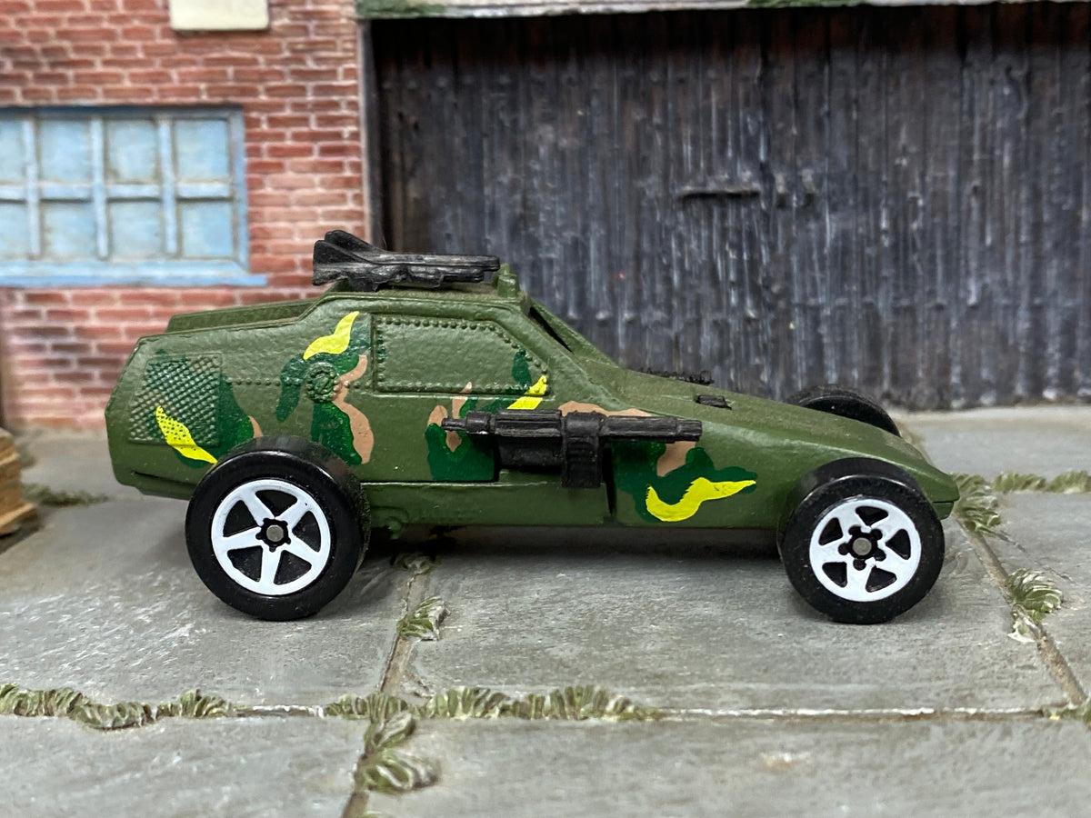 Hot Wheels Super Cannon olive camouflage with white five-spoke wheels, right side view